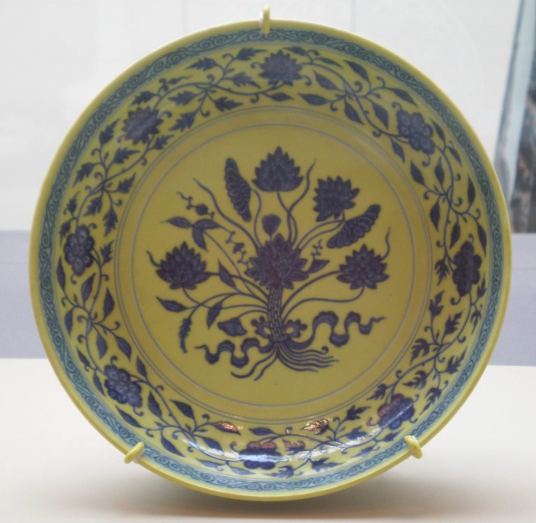 Ming plate with lotus on yellow ground, Asian Art Museum
