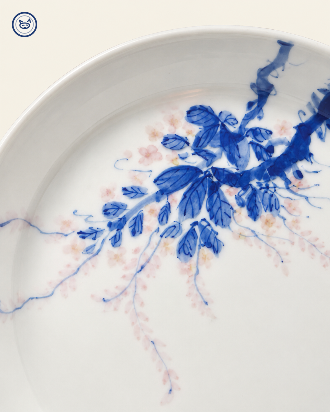 Blue-and-white cat under flowering branch plate, Jingdezhen