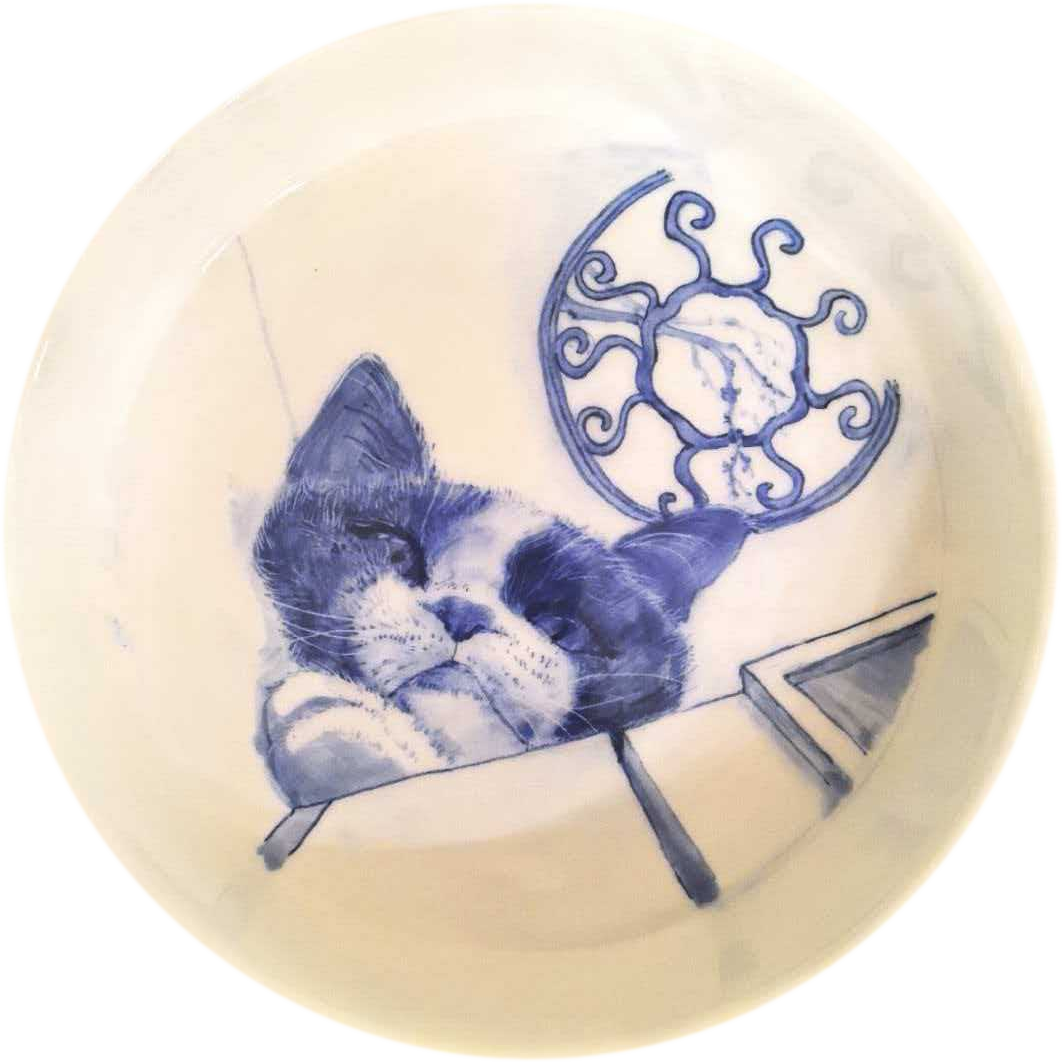 Customer's cat hand-painted in blue-and-white on a porcelain dish