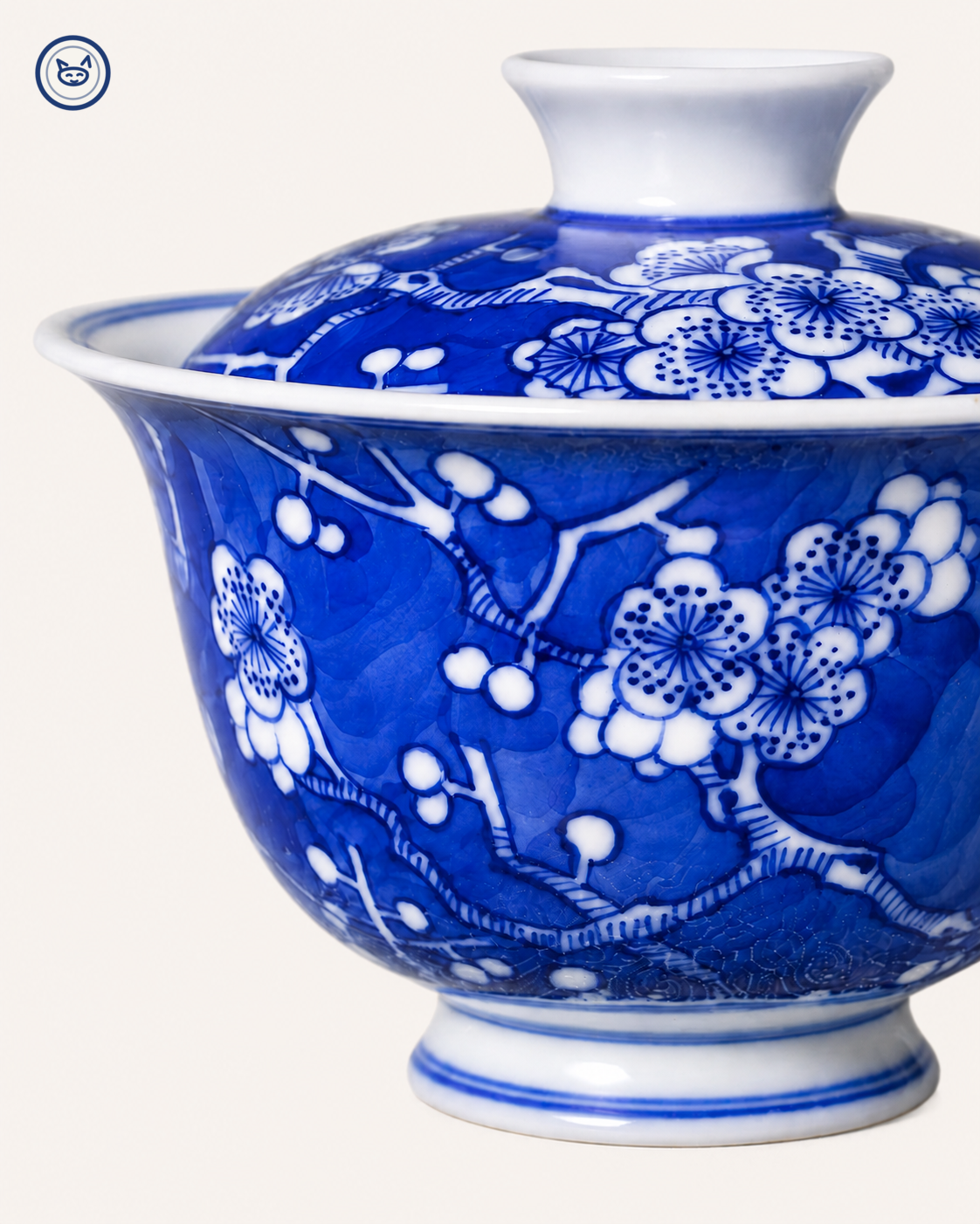 Blue-and-white ice-plum gaiwan, white prunus reserved on cobalt ground, Jingdezhen